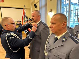 Zdjęcie przedstawia policjantów podczas ślubowania.